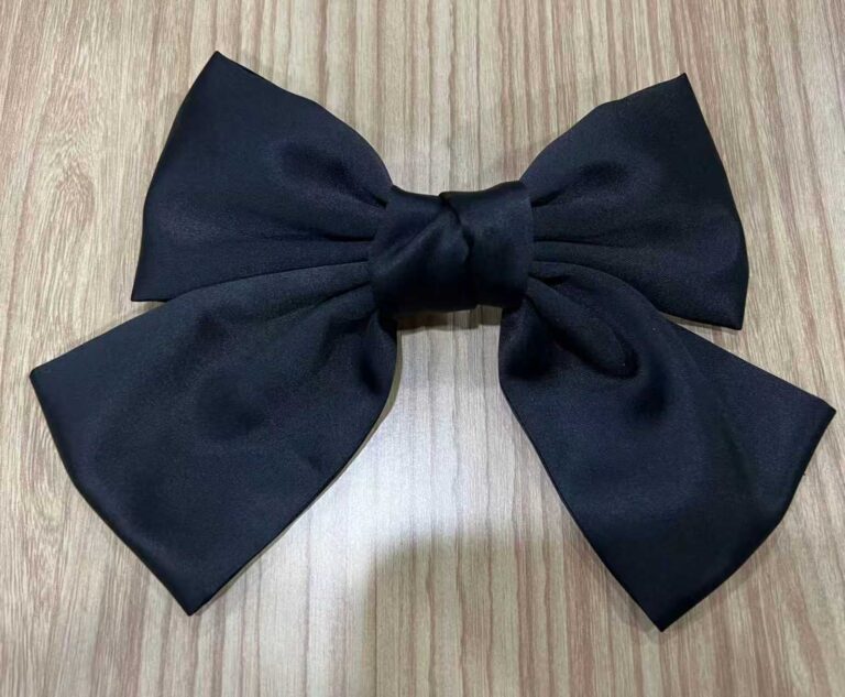 Black polysilk bow clip